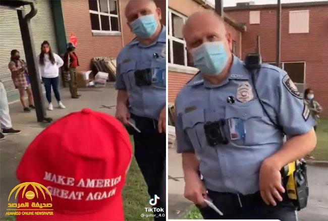 شاهد.. شرطي أمريكي يهدد شخص بالاعتقال إذا ارتدى قبعة تحمل شعار ترامب