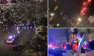 شاهد : فوضى عارمة وسيارة "دودج" تفحط أمام سيارة شرطة في مدينة فيلادلفيا الأمريكية